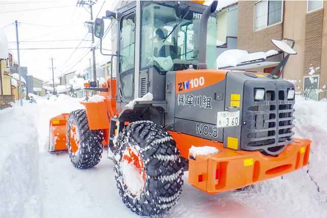 トラクターショベル除雪作業